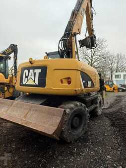 Pelle sur pneus 2014 Caterpillar 313 D (11)