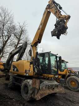 Pelle sur pneus 2014 Caterpillar 313 D (4)