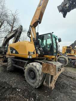 Pelle sur pneus 2014 Caterpillar 313 D (5)