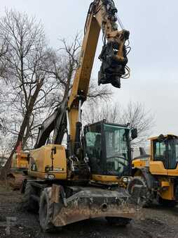 Pelle sur pneus 2014 Caterpillar 313 D (9)