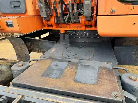 Pelle sur pneus 0 Doosan DX 210 W (12)