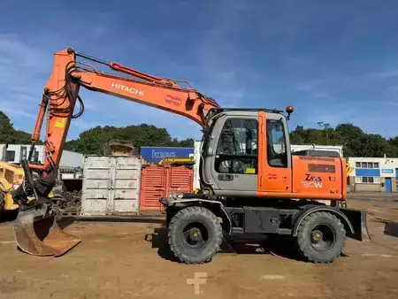 Escavatori gommati 2006 Hitachi ZX 130 W (1)
