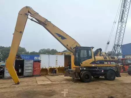Kuvert Grävare 2005 Caterpillar M 325 C MH (1)