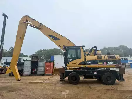 Kuvert Grävare 2005 Caterpillar M 325 C MH (2)