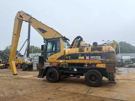 Kuvert Grävare 2005 Caterpillar M 325 C MH (3)