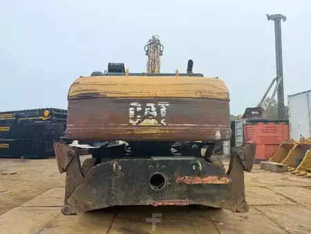 Kuvert Grävare 2005 Caterpillar M 325 C MH (4)