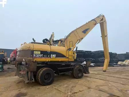 Kuvert Grävare 2005 Caterpillar M 325 C MH (6)