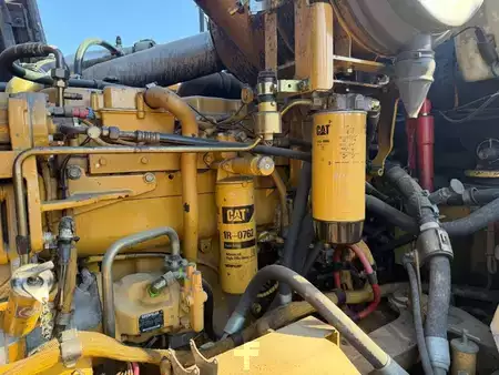 Artikulerte dumpere 2003 Caterpillar 725 (10)