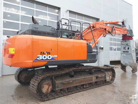 Hitachi ZX300LCN-6 +Demarec DXS-50