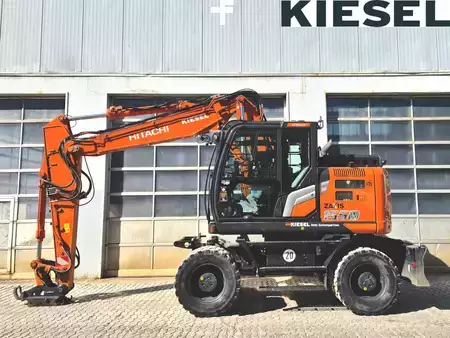 Escavatori gommati 2023 Hitachi ZX155W-7 (1)