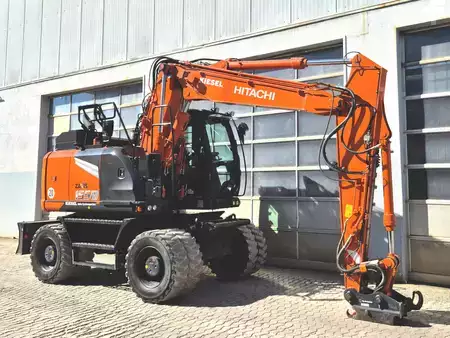 Escavatori gommati 2023 Hitachi ZX155W-7 (4)