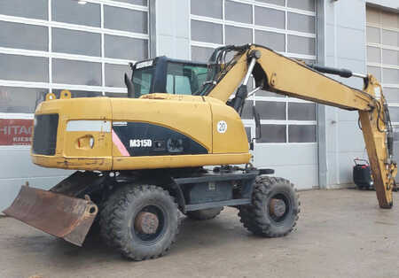 Escavatori gommati 2008 Caterpillar M315D (6)