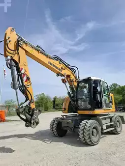 Pelle sur pneus 2023 Liebherr A 916 Compact Litronic G6.0-D (1)