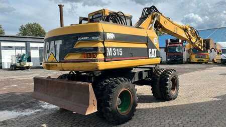 Escavatori gommati 1997 Caterpillar M 315 Mobilbagger 16170 Kg (4)