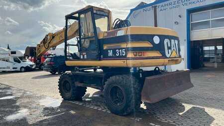 Escavatori gommati 1997 Caterpillar M 315 Mobilbagger 16170 Kg (5)