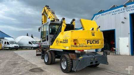 Fuchs TeRex MHL 320 D Umschlagbagger Greifer Pratzen