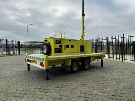 Atlas Copco Unique generator with light pole on trailer!