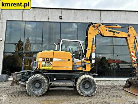 Mobilní bagry 2011 Liebherr A 309 KOPARKA KOŁOWA 2011R. | JS 130 313 CAT KOMATSU PW 148 (12)