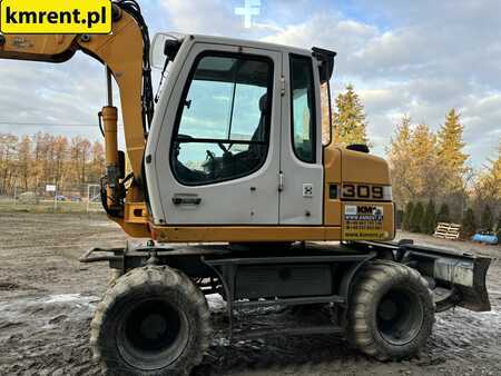 Mobilní bagry 2011 Liebherr A 309 KOPARKA KOŁOWA 2011R. | JS 130 313 CAT KOMATSU PW 148 (8)