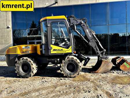 Pelle sur pneus 2014 Mecalac 12 MTX (1)
