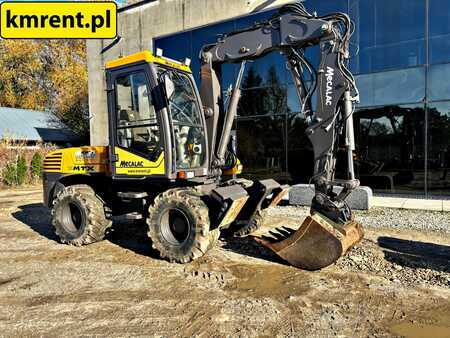 Pelle sur pneus 2014 Mecalac 12 MTX (12)