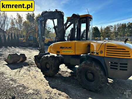 Pelle sur pneus 2014 Mecalac 12 MTX (20)