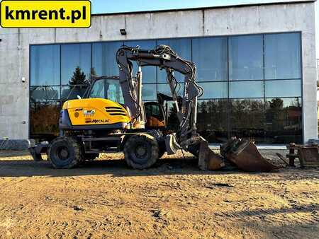 Pelle sur pneus 2010 Mecalac 714 MW (1)