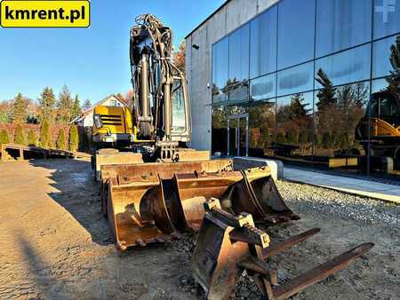 Pelle sur pneus 2010 Mecalac 714 MW (14)