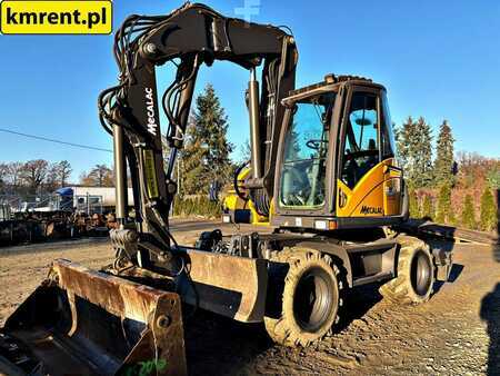 Pelle sur pneus 2010 Mecalac 714 MW (15)