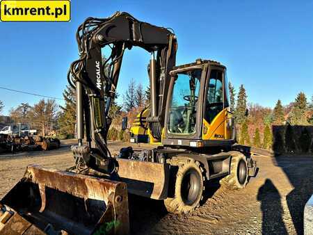 Pelle sur pneus 2010 Mecalac 714 MW (17)