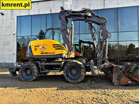 Pelle sur pneus 2010 Mecalac 714 MW (18)