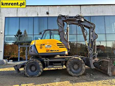 Pelle sur pneus 2010 Mecalac 714 MW (2)