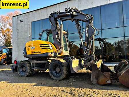 Pelle sur pneus 2010 Mecalac 714 MW (20)