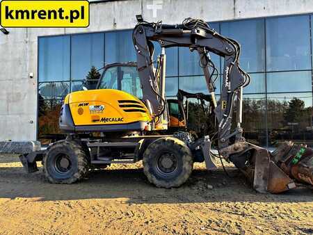 Pelle sur pneus 2010 Mecalac 714 MW (4)