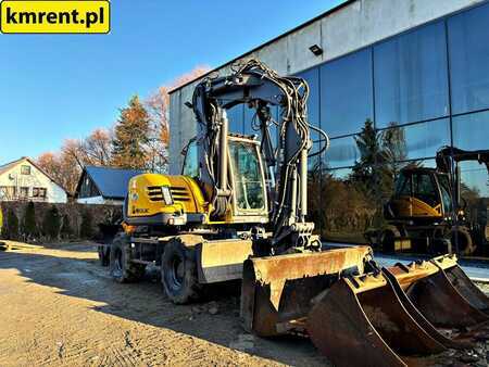 Pelle sur pneus 2010 Mecalac 714 MW (7)