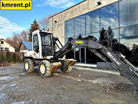 Pelle sur pneus 2011 Mecalac 12 MTX KOPARKO-ŁADOWARKA 2011r. | mecalac 12 msx mxt 714 jcb 3cx (10)