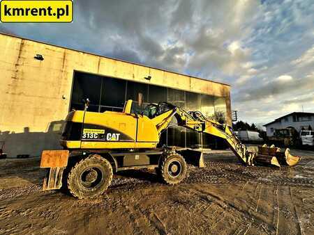 Pelle sur pneus 2005 Caterpillar M313C (11)
