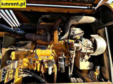 Pelle sur pneus 2005 Caterpillar M313C (13)