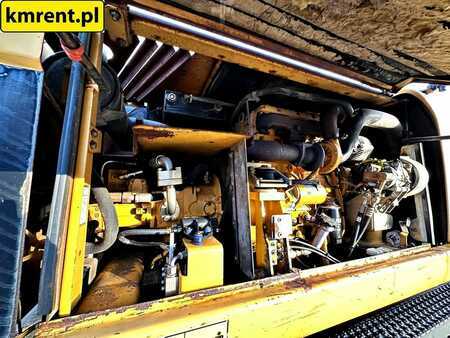 Pelle sur pneus 2005 Caterpillar M313C (14)