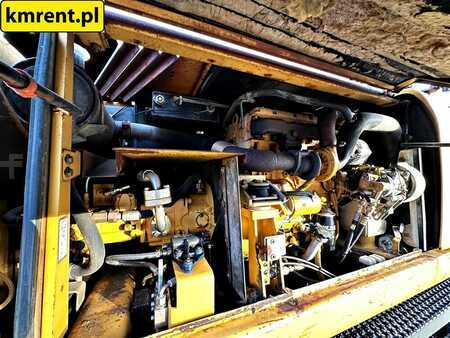 Pelle sur pneus 2005 Caterpillar M313C (15)
