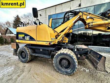 Pelle sur pneus 2005 Caterpillar M313C (17)