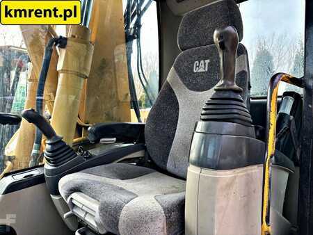 Pelle sur pneus 2005 Caterpillar M313C (20)