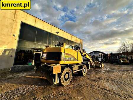 Pelle sur pneus 2005 Caterpillar M313C (4)