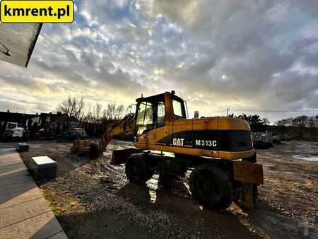 Pelle sur pneus 2005 Caterpillar M313C (7)