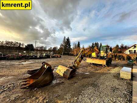 Pelle sur pneus 2005 Caterpillar M313C (8)