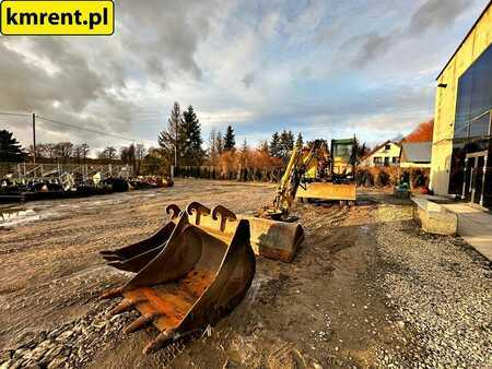 Pelle sur pneus 2005 Caterpillar M313C (9)