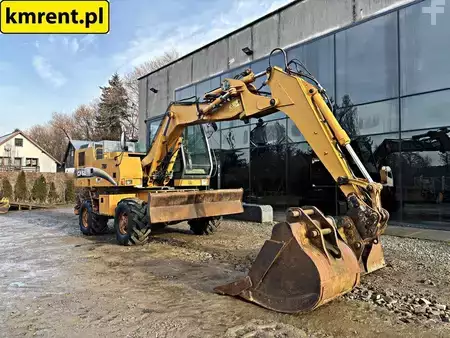 Pelle sur pneus 2001 Case 788-P (7)