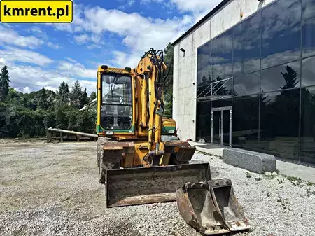 Pelle sur pneus 1999 Mecalac 12 MXT (6)