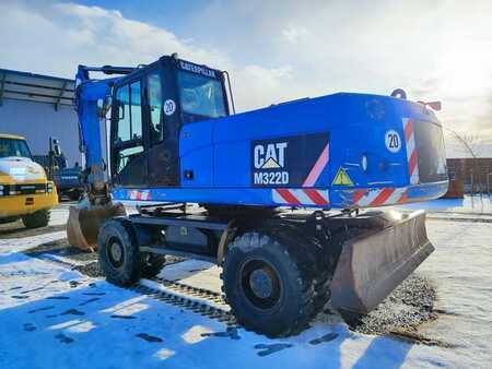 Pelle sur pneus 2010 Caterpillar M322D (1)