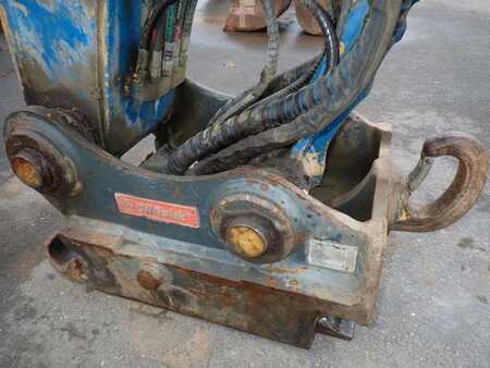 Pelle sur pneus 2010 Caterpillar M322D (10)